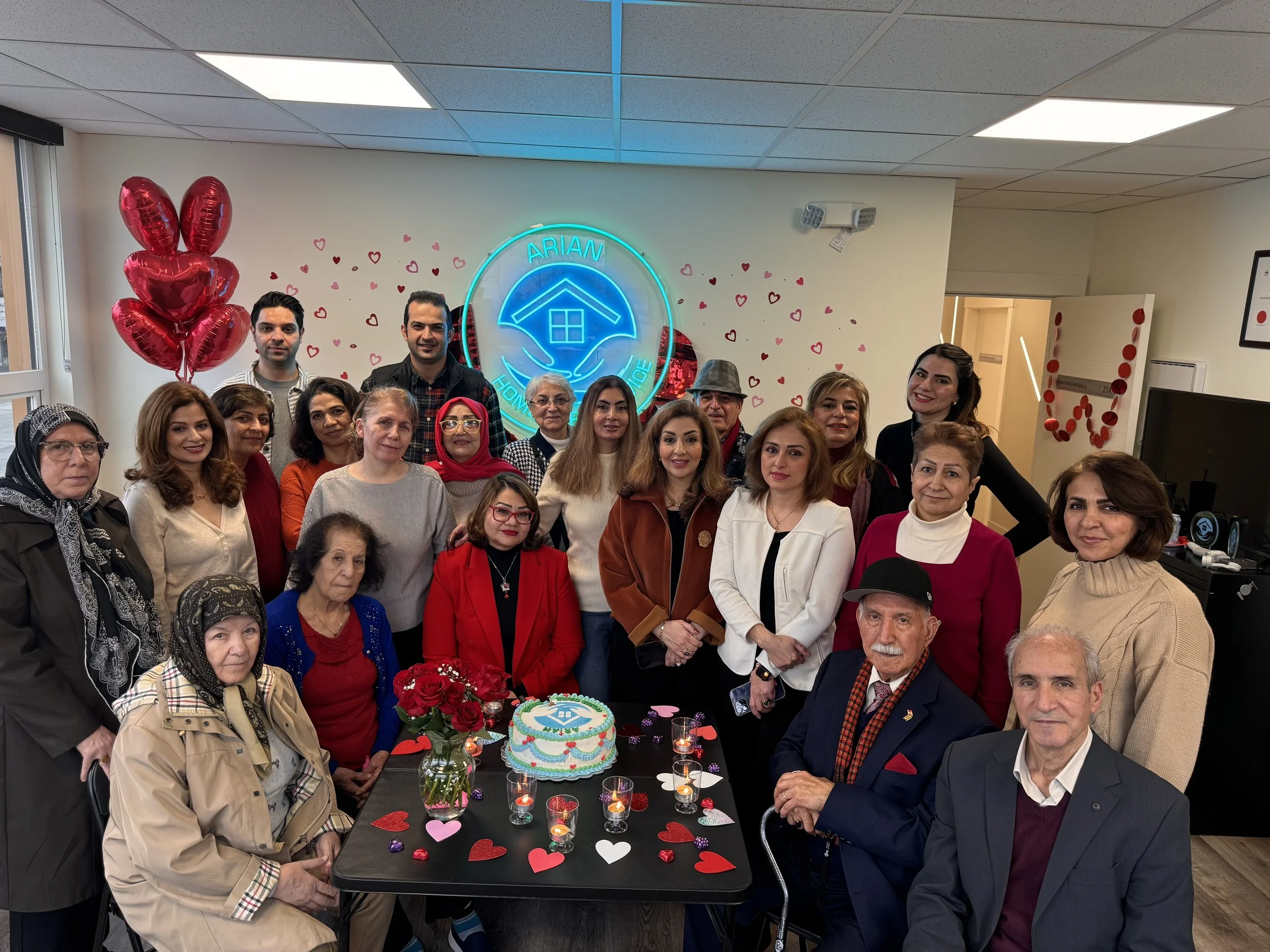 A family celebrating a birthday together at home